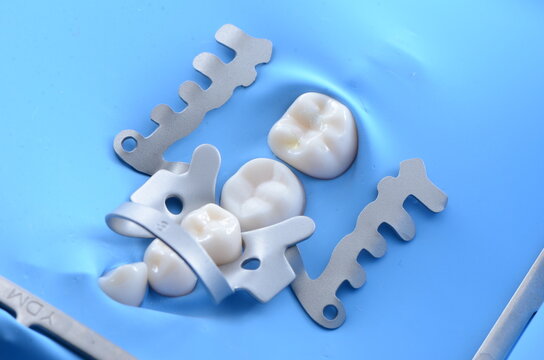 Rubber Dam Sheets and Clamps
High-quality images showcasing rubber dam sheets and clamps used for effective isolation in dental procedures. Perfect for educational and professional purposes.