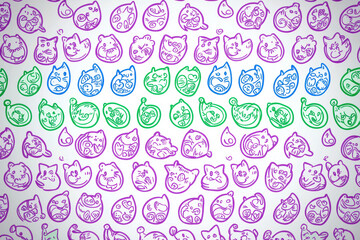 Colorful doodle pattern of cute animal faces and leaves, playful design