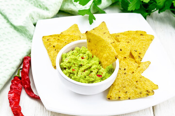 Guacamole in bowl on table