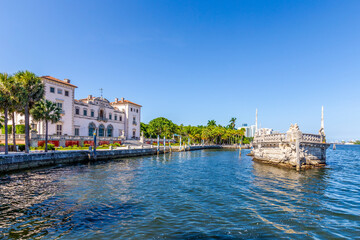 Stone breakwater barge and Magnificent Mansion,Vizcaya on Biscayne bay