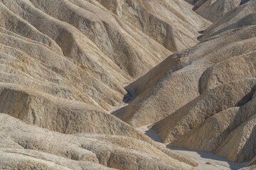 Zabriskie Point, Death Valley National Park, California. Playa and playa margin rocks of Furnace...