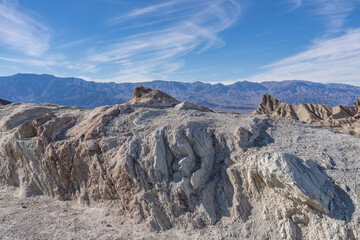 Zabriskie Point, Death Valley National Park, California. Playa and playa margin rocks of Furnace...