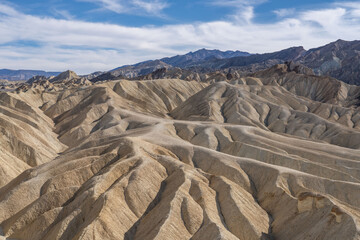 Zabriskie Point, Death Valley National Park, California. Playa and playa margin rocks of Furnace...