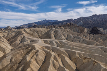 Zabriskie Point, Death Valley National Park, California. Playa and playa margin rocks of Furnace...