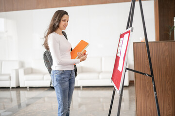 indian collage or university student checking the results or checking notice board