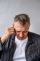 distorted face of sad and grieved very upset person, dissatisfied with his hard fate