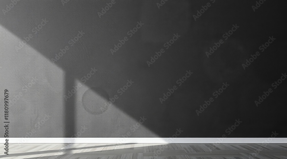 Poster shadow cast on textured wall and floor, creating a minimalist and dramatic visual effect