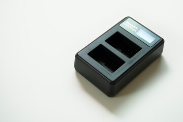 November,30,2024 Phuket,Thailand Charger Battery Camera On White Background