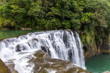 Fototapeta premium Taiwan Shifen waterfall with mountain