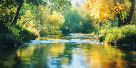Fototapeta premium Serene countryside scene featuring a blurred background with a tranquil river and lush trees, showcasing the beauty of nature in the countryside. Ideal for nature lovers and tranquility seekers.