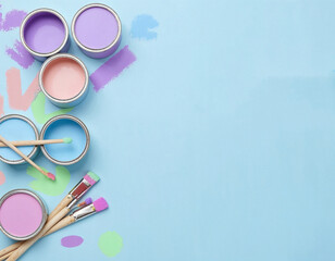Fototapeta premium Pastel Paint Pots Brushes Blue Background Creative Art Supplies