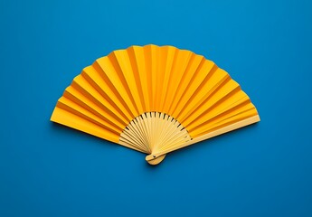Yellow paper fan on a blue background
