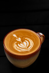 Latte coffee on a black background