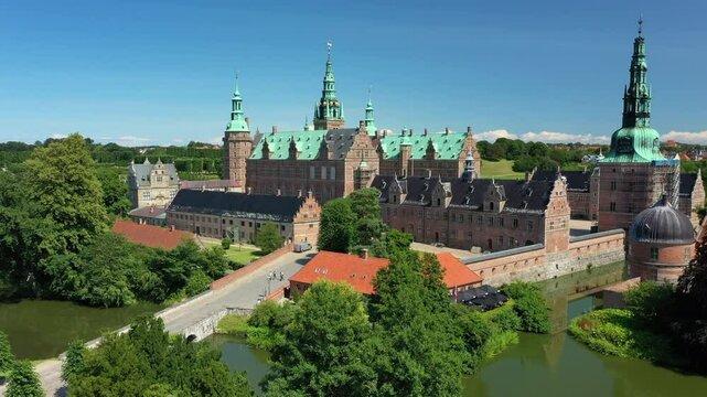 Frederiksborg Castle Complex In Daytime In Hillerod, Denmark. - aerial ascend shot
