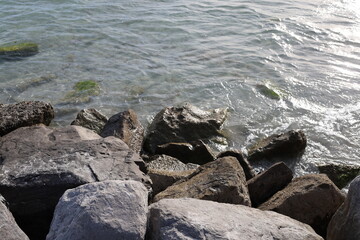 Large size breakwater rock in salty water