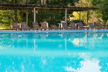 Sun bed near the pool in the resort, Brazil