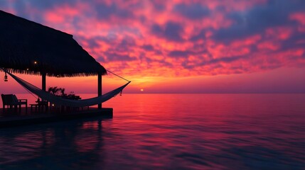 romantic sunset overwater bungalow - vibrant colors