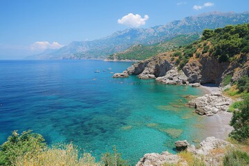 Turquoise sea coast with rocky cliffs and green forest