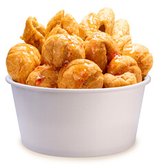 Deep fried fish balls in paper bucket isolated on white background, Deep fried fish balls with spicy sauce on white With work path.