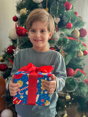 Joyful Boy with a Christmas Surprise