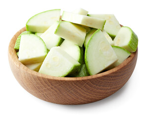 sliced zucchini or marrow in wooden bowl isolated on white background. clipping path
