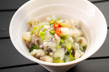 Japanese cuisine, mustard octopus sashimi in a white bowl