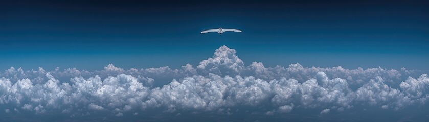 Fototapeta premium A serene sky with fluffy clouds and a single bird soaring above.