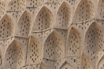 Details of the ornamental brick work on a dome of a mausoleum in Yazd, Iran.
