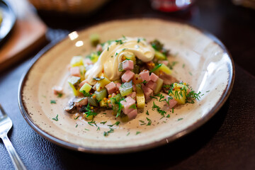 Salad with potatoes, sour cream and mushrooms