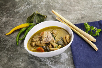Thai green curry soup with basil