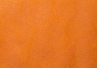 オレンジ色の和紙の背景テクスチャ