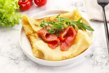 Russian pancake with salmon fish