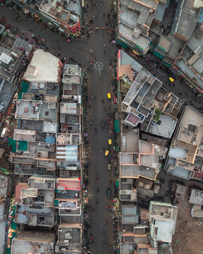 Aerial view of vibrant and bustling Kote Gate with crowded streets and colorful buildings, Bikaner, India.