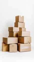 Obraz premium A stack of cardboard boxes arranged in a pyramid shape.