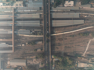 Aerial view of busy Ajmeri Gate train station with modern architecture and urban landscape, New Delhi, India.