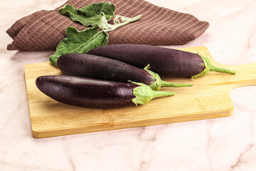 Small few baby eggplant over board