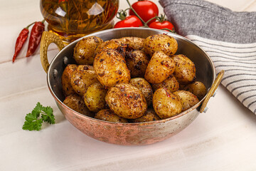Baked mini potato with herbs