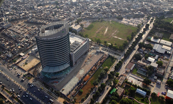 Aerial view of modern urban landscape with busy roads and skyscrapers, Lahore, Pakistan.