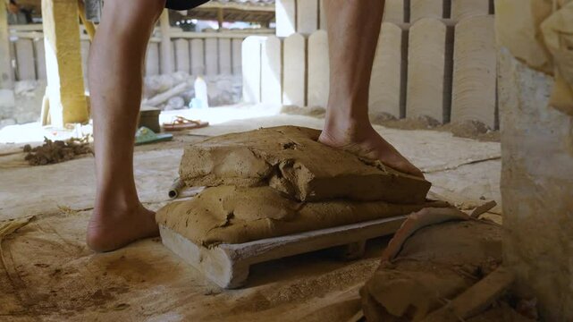 A scene of traditional Vietnamese roof tile making