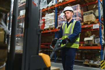 warehouse worker driving forklift. Warehouse worker preparing products for shipmennt, delivery,...