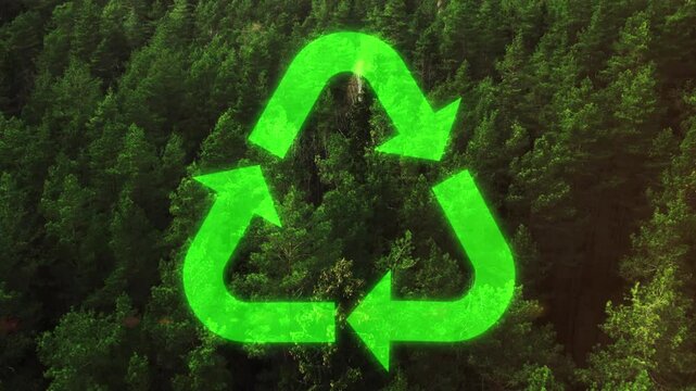 Animated renewable energy symbol on green forest background. Sustainability and technology. Energy consumption and reduction of CO2 emissions. Sustainable energy sources. Sustainability in Nature, 4k.