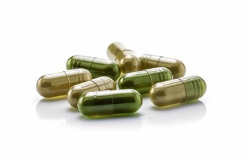Isolated Herbal Capsules in Green and Gold Colors on a Reflective Surface for Health and Wellness Products Display