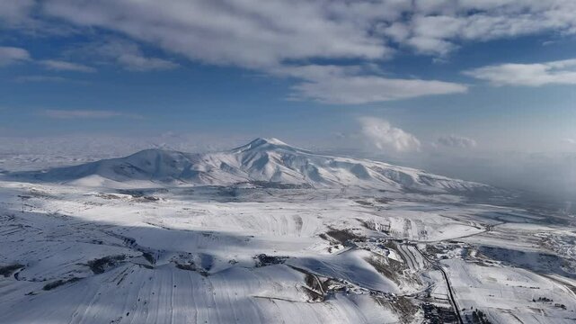 Winter in the mountains, beautiful winter landscape, inspiring winter beauty of the mountains, cloudy mountains