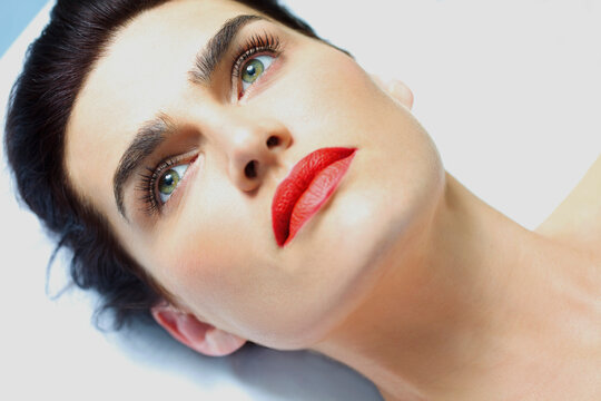 Close up of Woman's Face with Red Lipstick - High angle view
