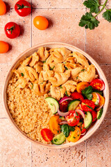 Bowl of quinoa with vegan soy meat and vegetables.
