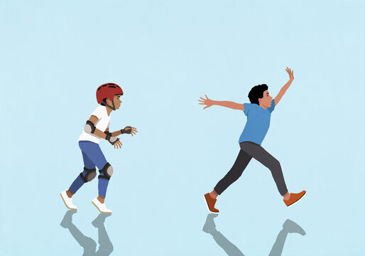 Boy in protective bicycle helmet and pads chasing running boy
