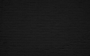 Schwarze Backsteinwand als urbane Textur oder Hintergrund mit Textfreiraum