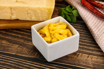 Yellow cheese sauce in the bowl