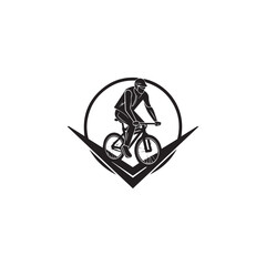 silhouette of a person riding a bicycle