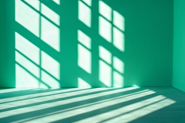 Obraz premium Sunlight casts gridded shadows on teal walls and floor.